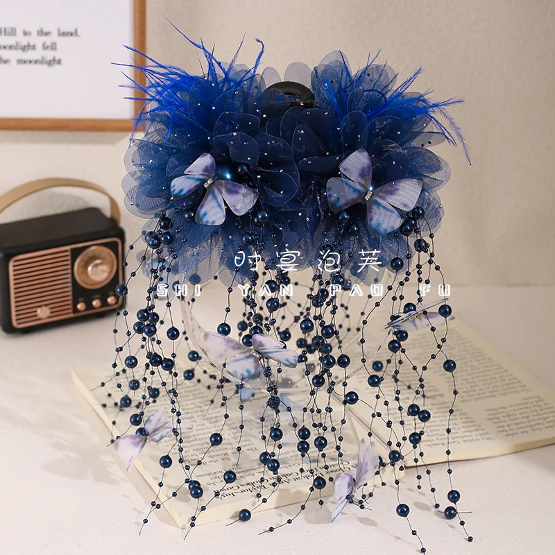 蝴蝶仙子入冬新款蝴蝶流苏抓夹原创设计百搭发饰鲨鱼夹珠珠发夹女