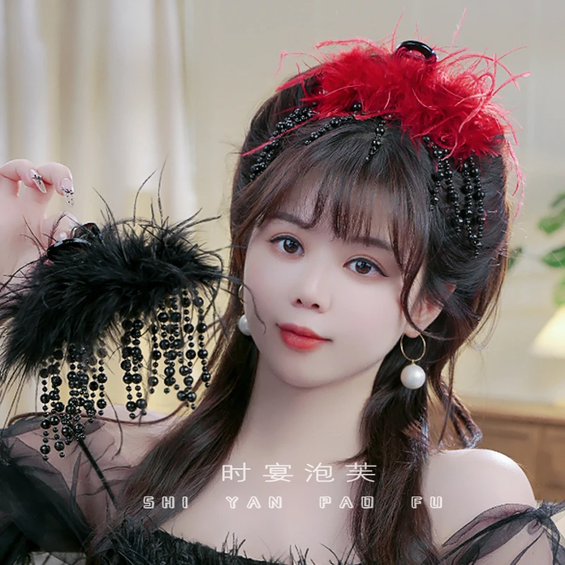 一帘幽梦秋冬新款羽毛流苏鲨鱼夹氛围感蓬松显发量抓夹高级感发饰