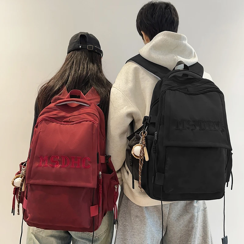 书包男韩版高中生大学生双肩包减负护脊初中生女款大容量秋冬背包