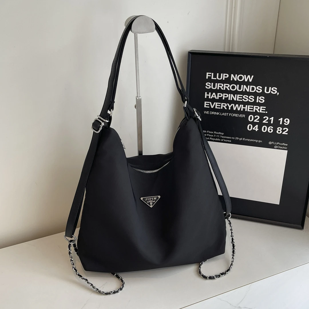 新款休闲背包旅行包单肩斜跨大容量防水包包女简约百搭双肩包包潮