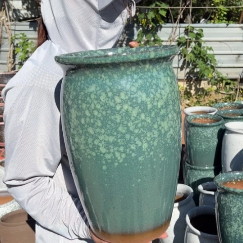 红陶20CM以下口21高34瑕疵