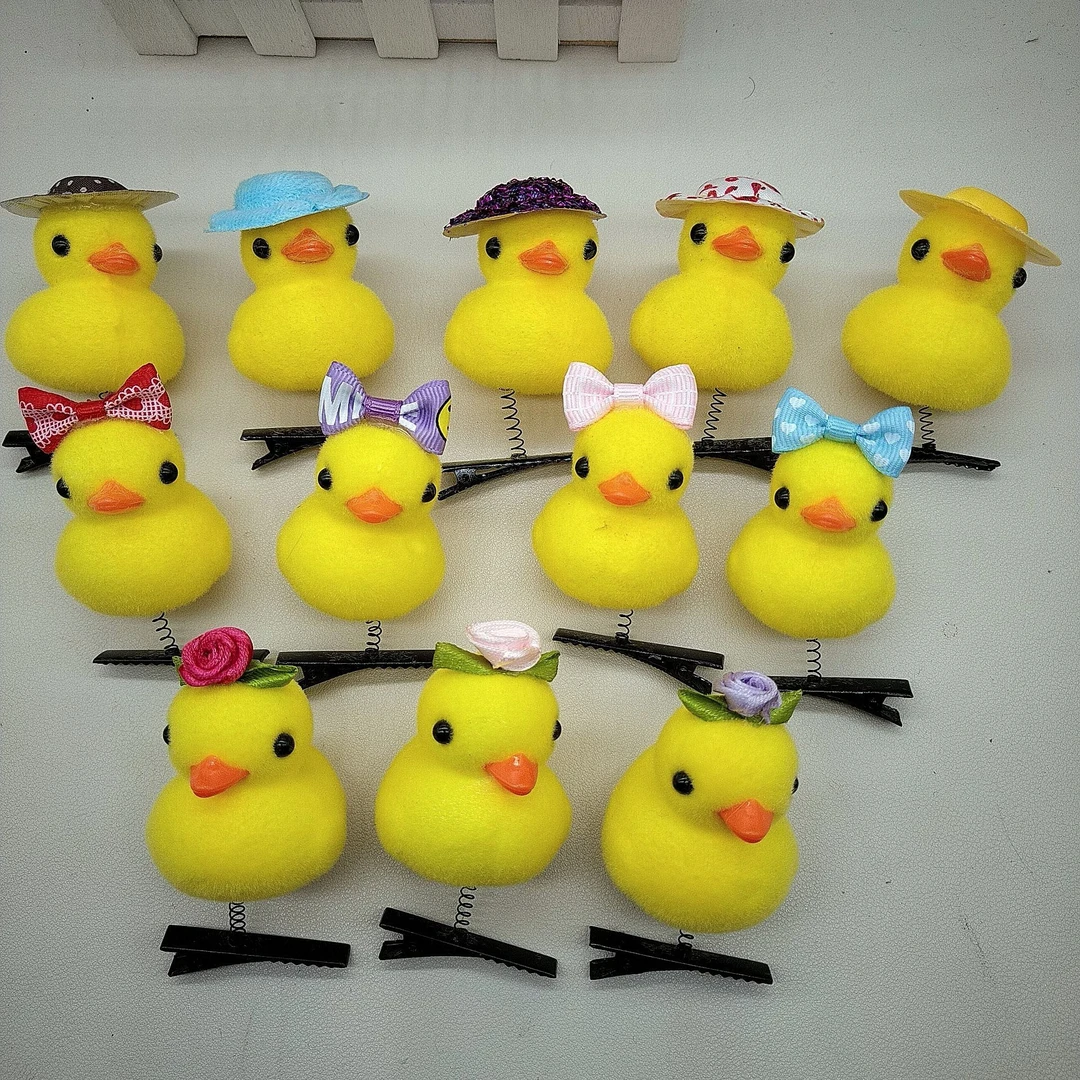 网红新品带帽子蝴蝶结玫瑰花小黄鸭发夹可爱超萌弹簧发夹扫码地推