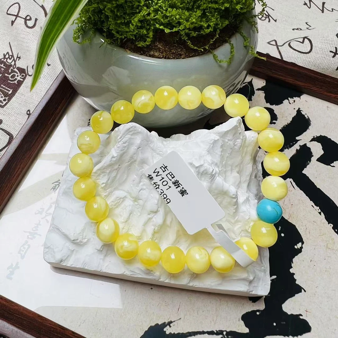 W101古巴新蜜圆珠白花手串8mm