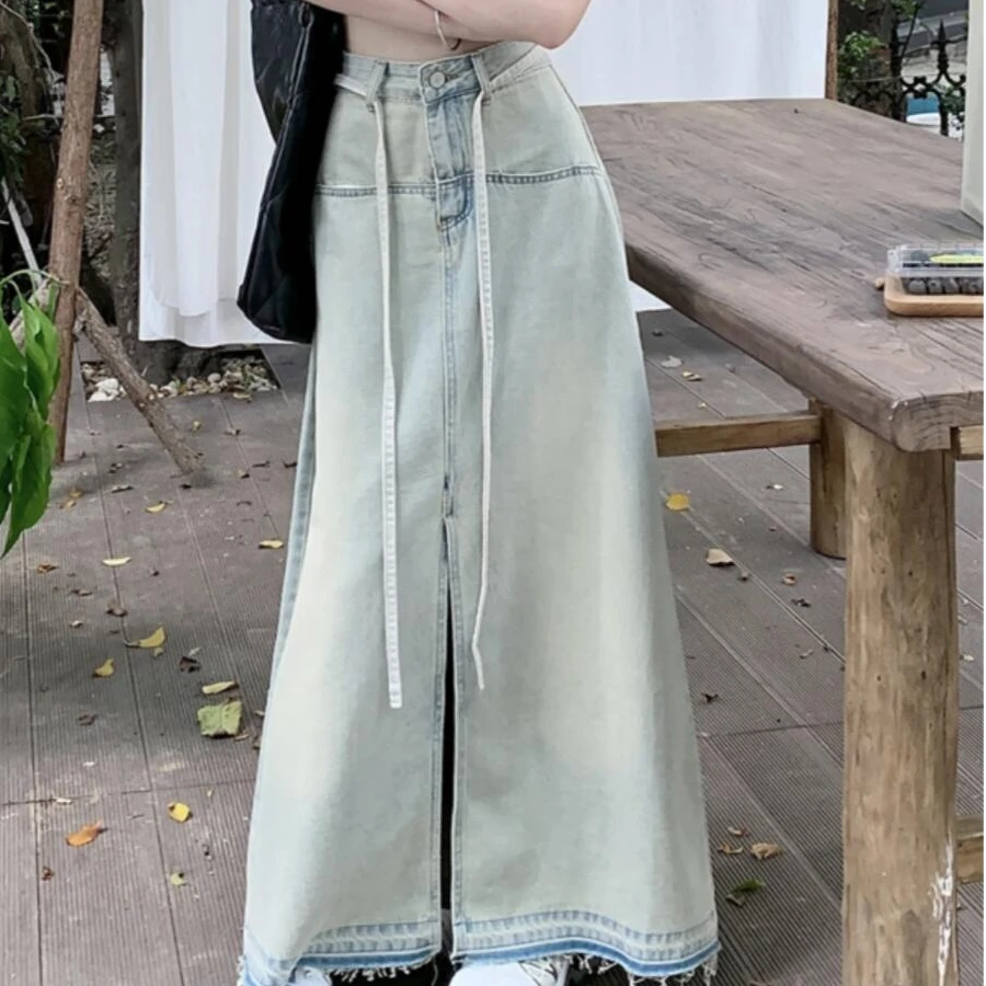 复古水洗做旧系带牛仔半身裙女2025春季新款小众毛边a字裙ins6680