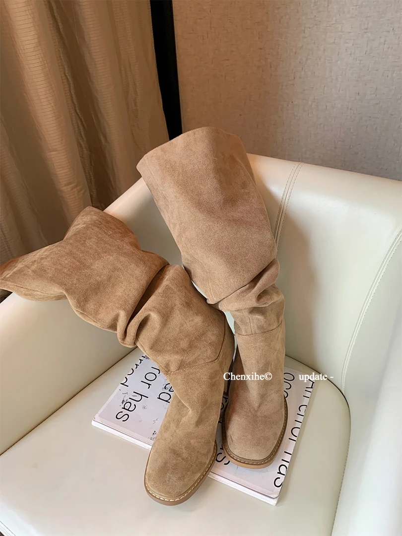 何晨曦6折清 卡其色猪皮革粗跟堆堆长筒靴女大筒围靴子TT06519