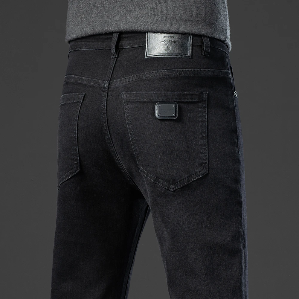 高端潮流黑色牛仔裤男士秋季棉弹修身简约水洗休闲百搭小直筒长裤