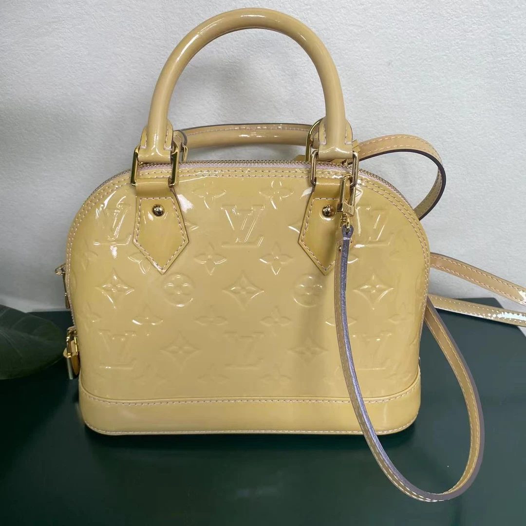 95新 LouisVuitton/路易威登 黄色漆皮 alma 贝壳包