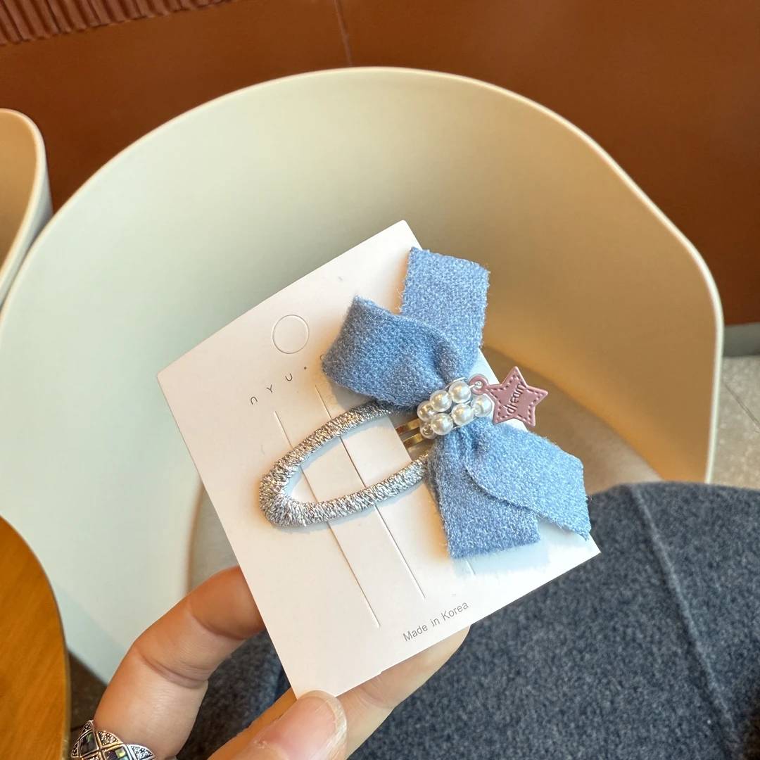 6774很小一只的蓝色蝴蝶结迷你掰掰夹