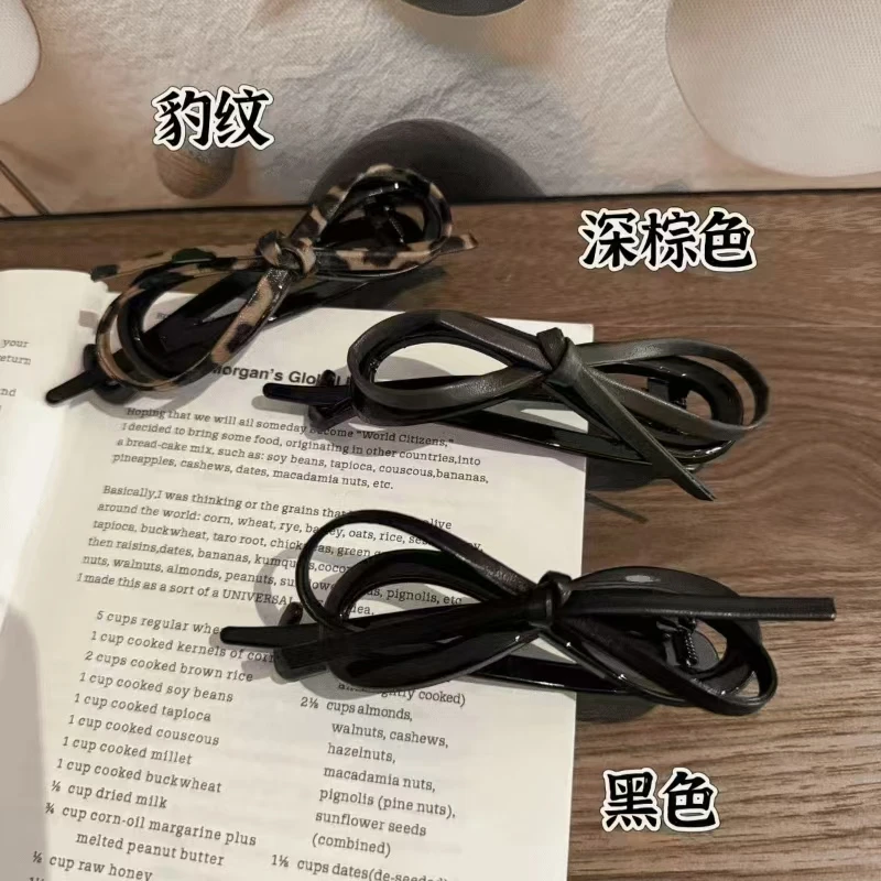新品气质皮质蝴蝶结扭扭夹女后脑勺盘发高级感一字夹2025年新年