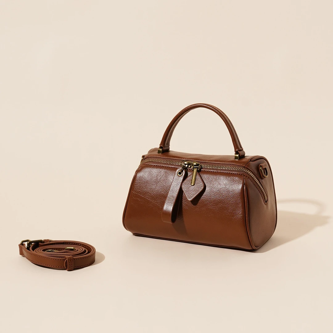 岩牛时尚百搭女士复古斜跨真皮单肩经典包包YN3453