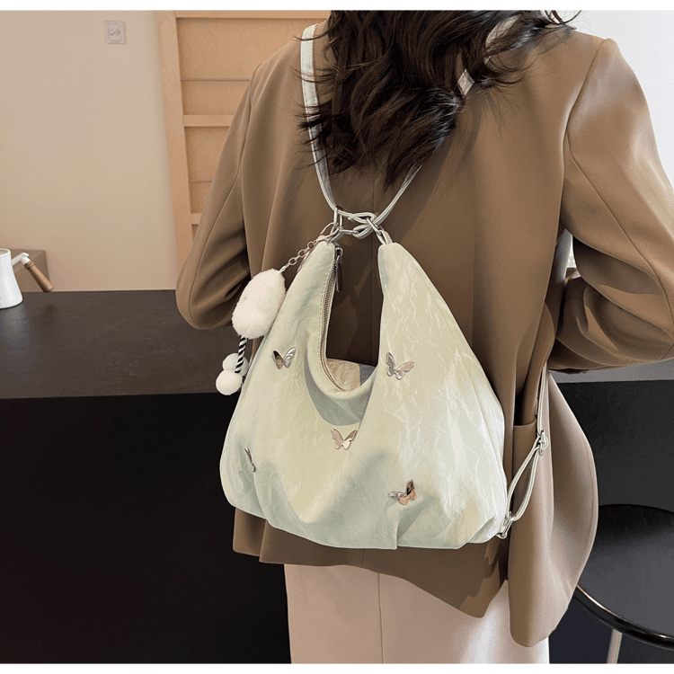 大容量通勤双肩包包女式2024新款时尚蝴蝶腋下单肩包百搭托特包