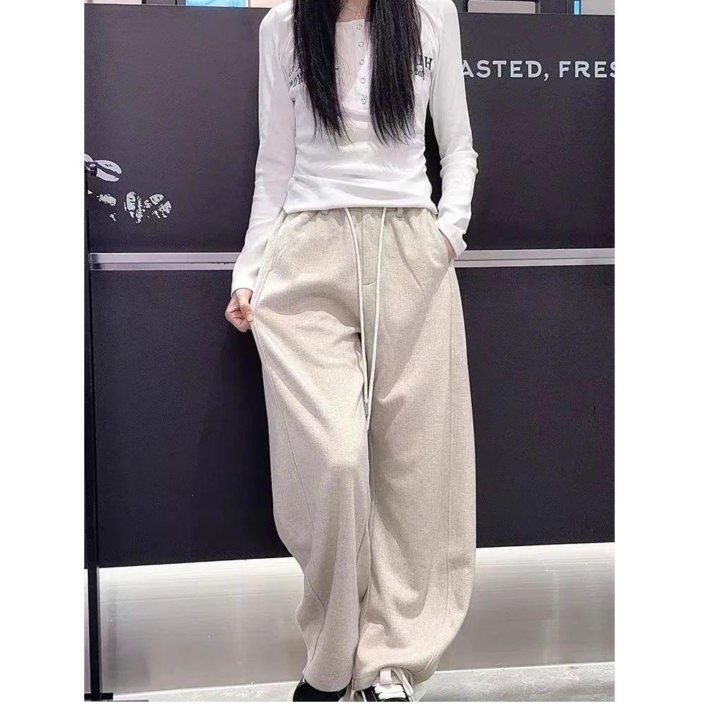 103秋冬暗纹结构潮流休闲弯刀裤