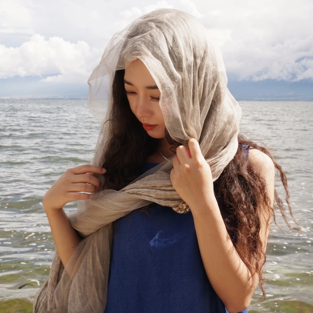 游尘衣物/羽围巾