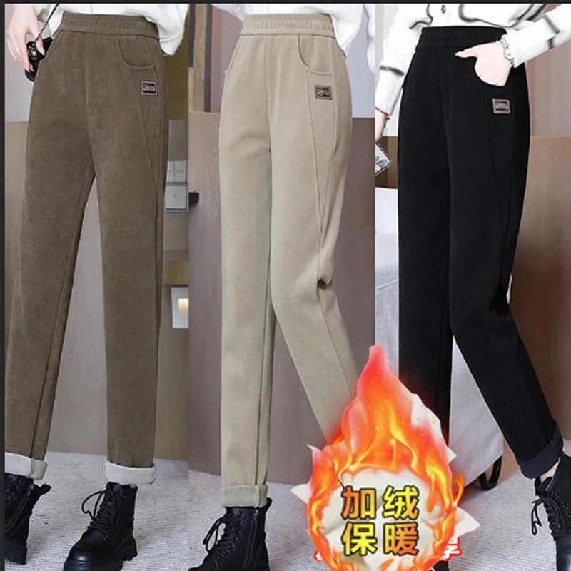 冬季哈伦裤加绒休闲裤新款加厚保暖直筒长裤大码小脚裤z2