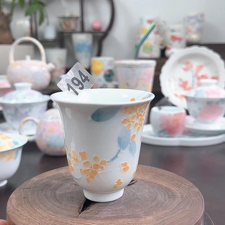194金桂釉下手绘品茗杯