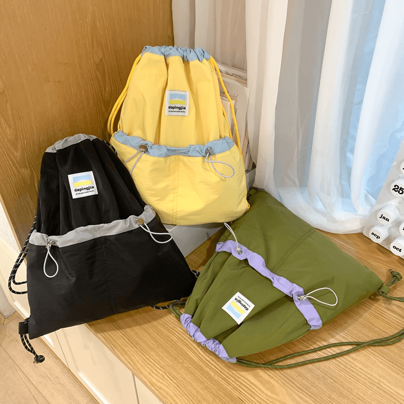 日系ins可爱抽绳束口袋女2024新款大容量撞色双肩包轻便小背包潮