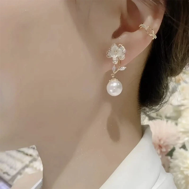 925银耳饰轻奢高级白色贝壳花耳环女新款潮气质甜美百搭花朵真珠