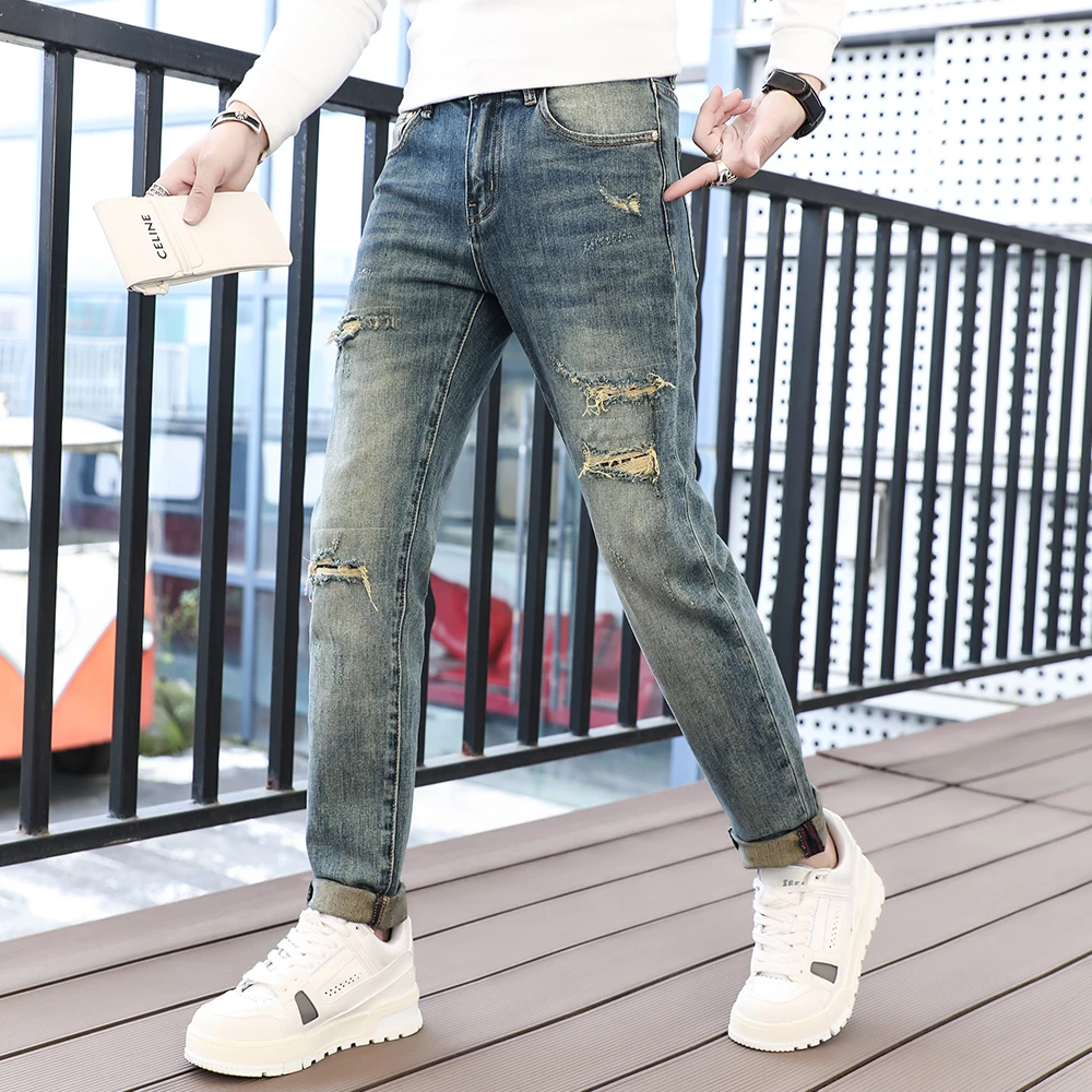 春夏新款蓝色休闲轻奢高端男士牛仔裤男款高档修身小脚时尚男裤子