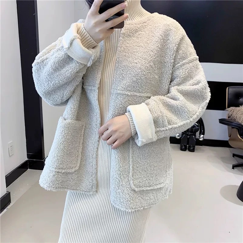 2900秋冬两面穿大衣女欧洲站皮毛一体宽松短外套