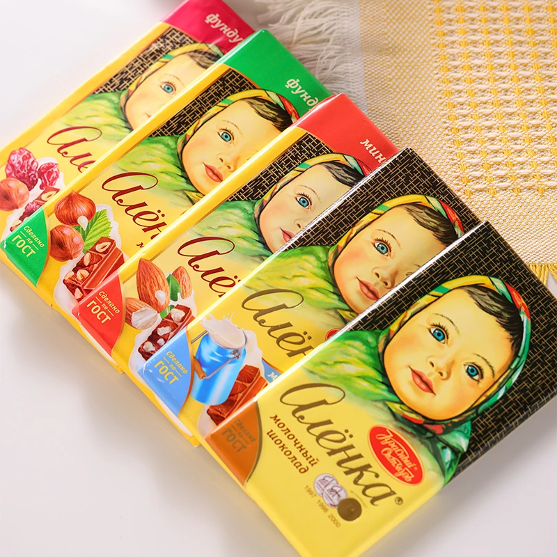 俄罗斯原装进口爱莲巧大头娃娃牛奶浓郁坚果榛子杏仁黑巧零食品