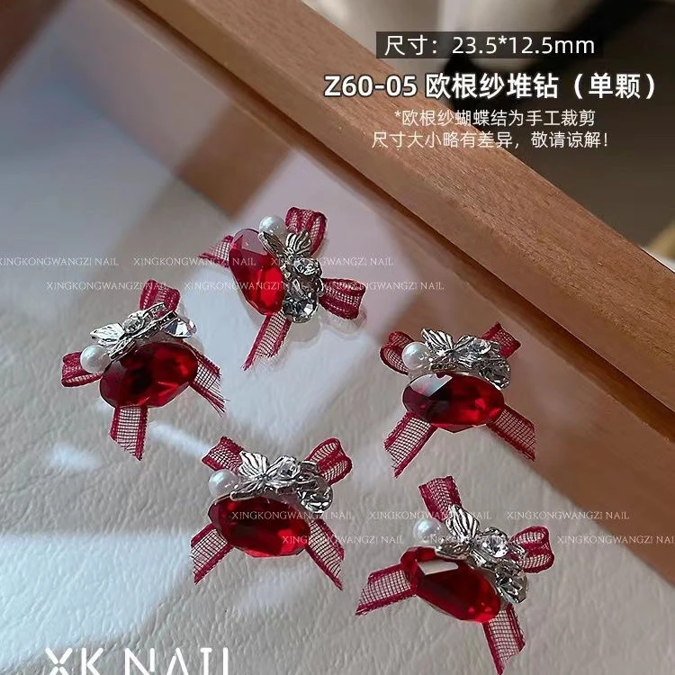 美甲欧根纱蝴蝶结堆钻2024新款红色鸽子蛋K9水钻蕾丝飘带指甲饰品