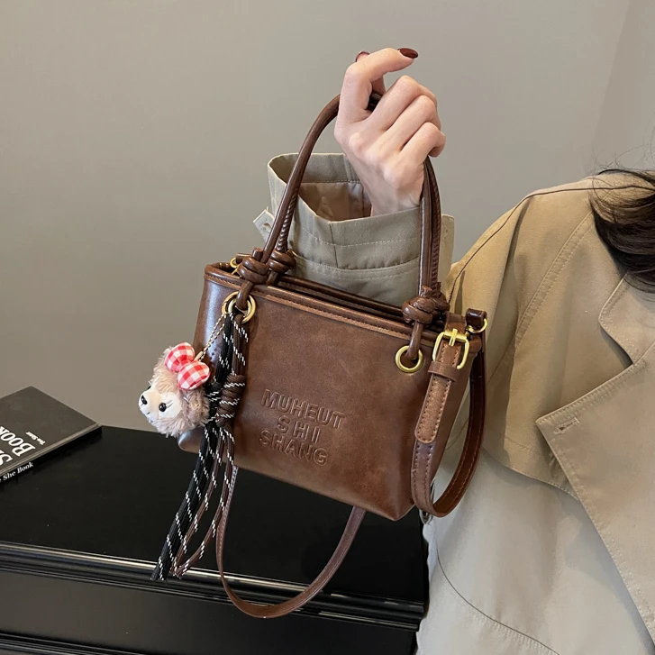 高级感复古美拉德棕色小包包女2024新款秋冬百搭斜挎包手提水桶包