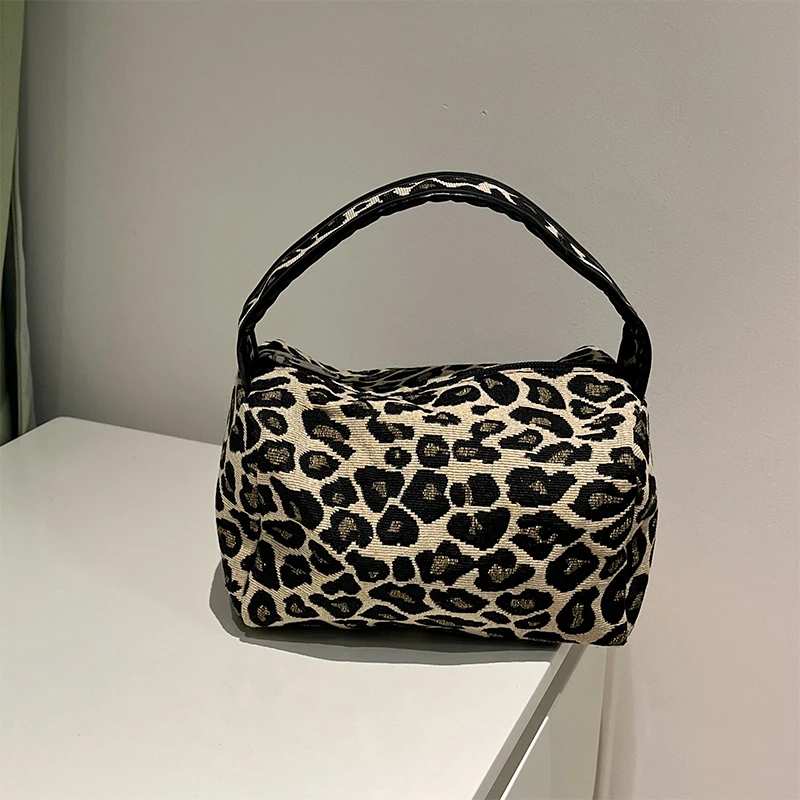 辣妹天菜！豹纹黑皮新款手提包大容量化妆包女便携通勤旅行收纳包