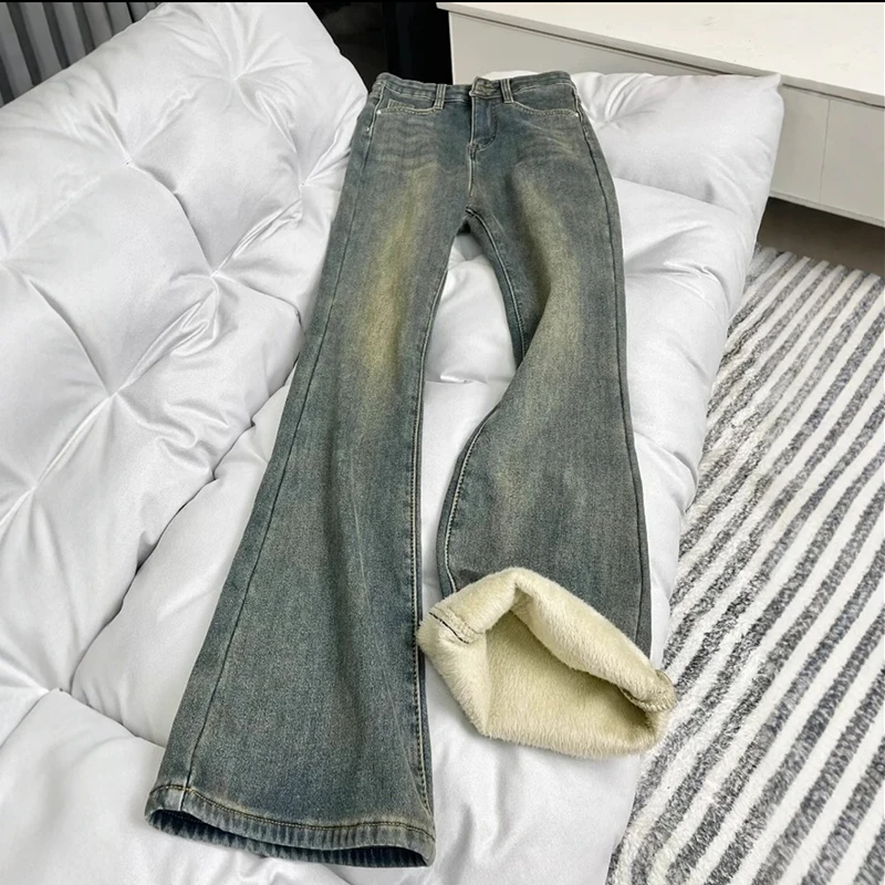 大码女装冬季新款加绒微喇牛仔裤女高腰显瘦弹力马蹄裤