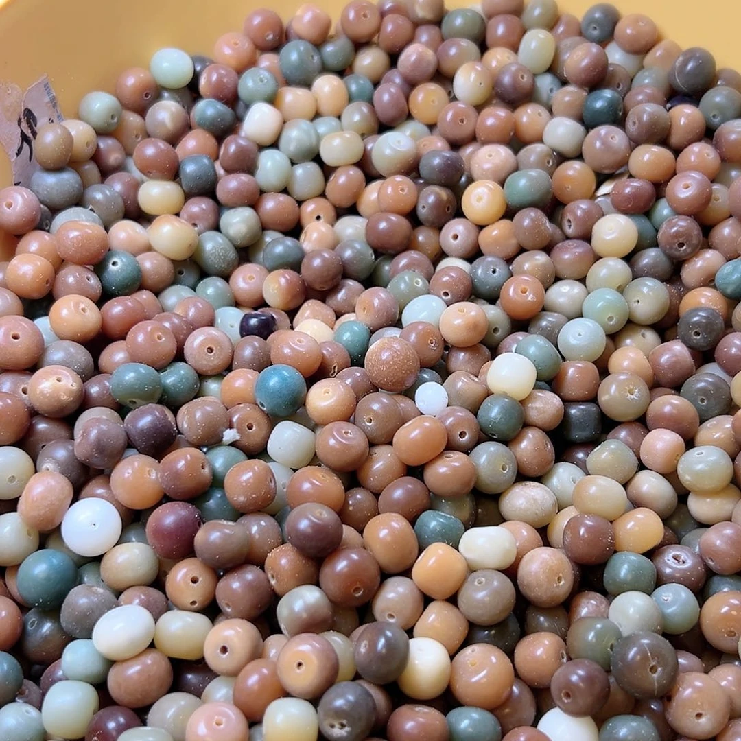 白玉菩提吊坠瑕疵敦黄混100颗卡牌➕200颗