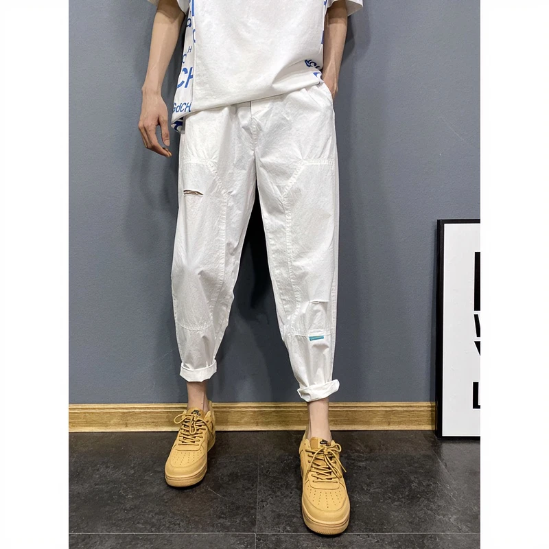 男士休闲裤百搭纯色白色裤子男韩版潮流夏季薄款刮烂破洞裤九分裤