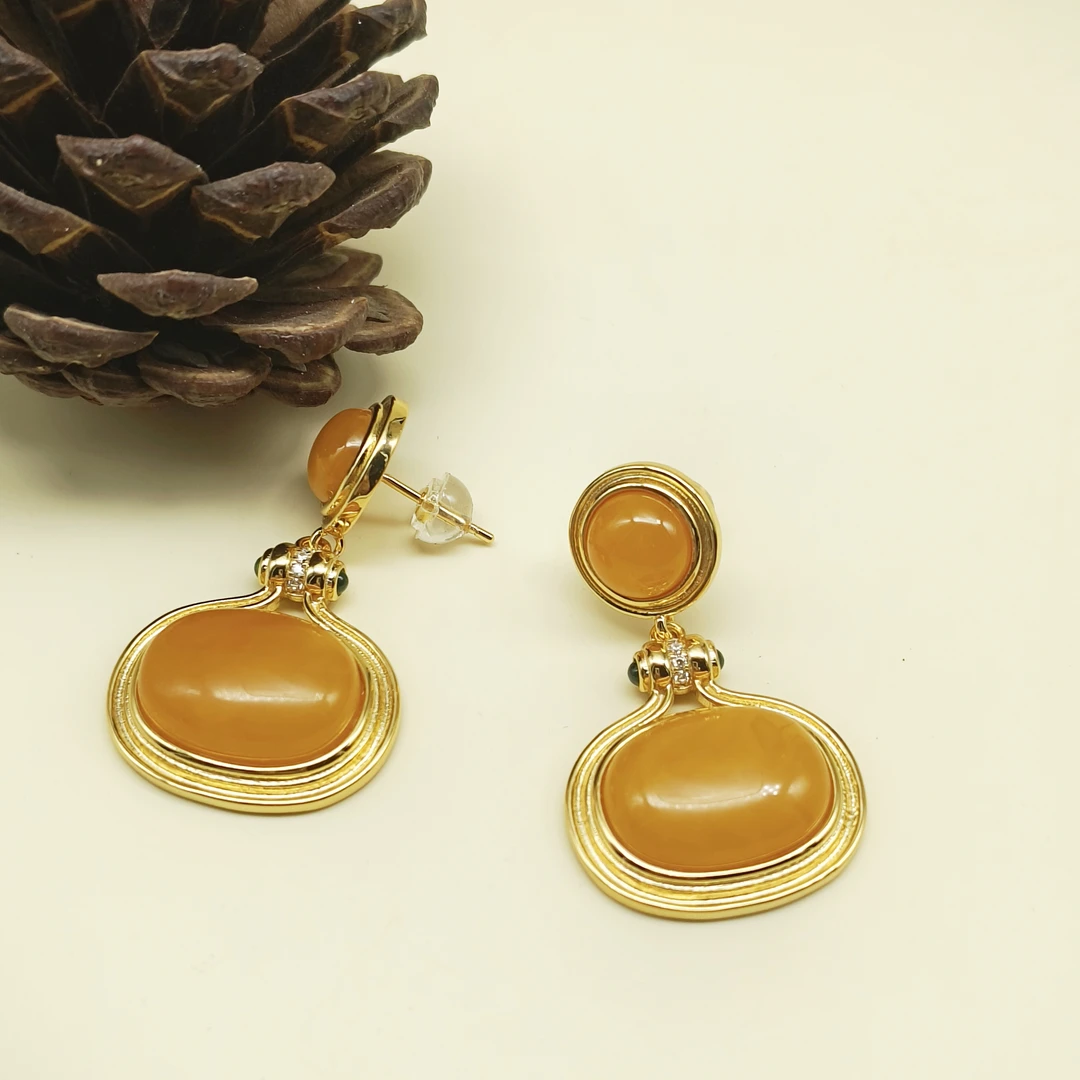 【珠宝天下】琥珀蜜蜡戒指925银镀金耳坠F22