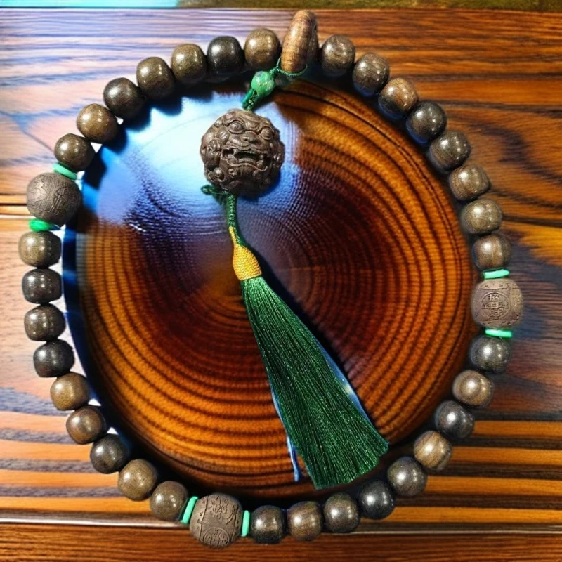 H54 C 老山檀卡1.2cm流苏招财进宝手持