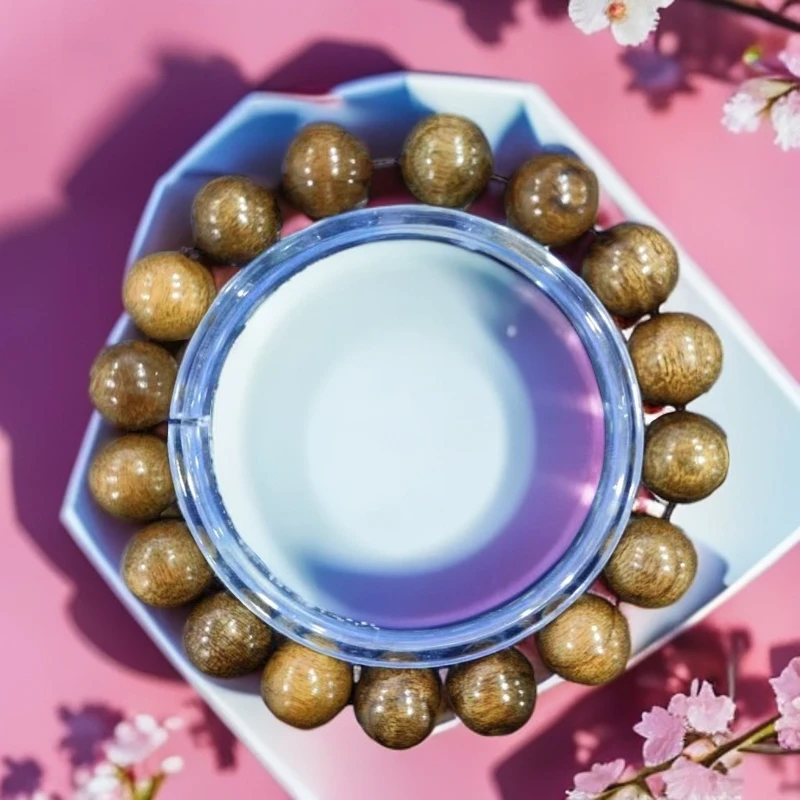 505  C金丝楠乌金1.2cm圆珠手串