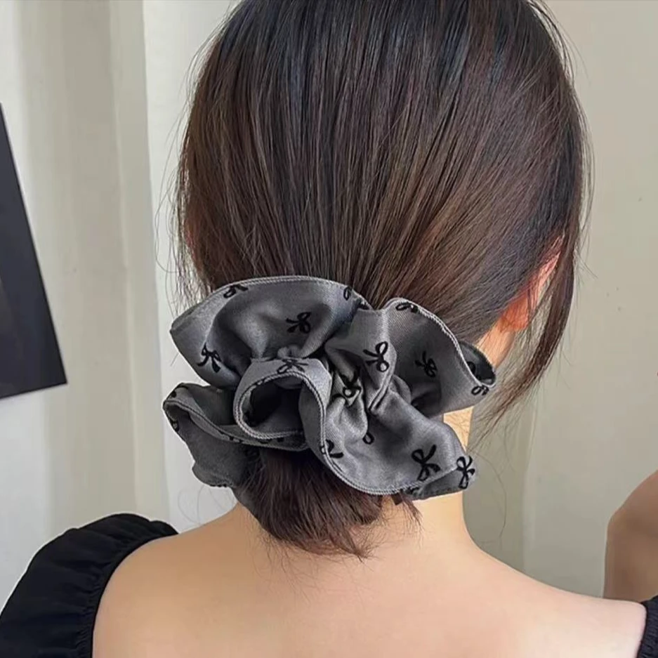 2025 高级格雷系感气质时尚肠圈黑色蝴蝶结 小蛮腰低马尾丸子头