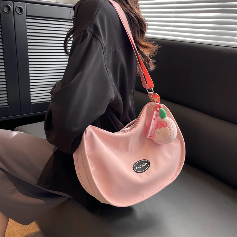百搭ins斜挎包包女2023新款新潮春夏饺子包女原创可爱小众帆布包