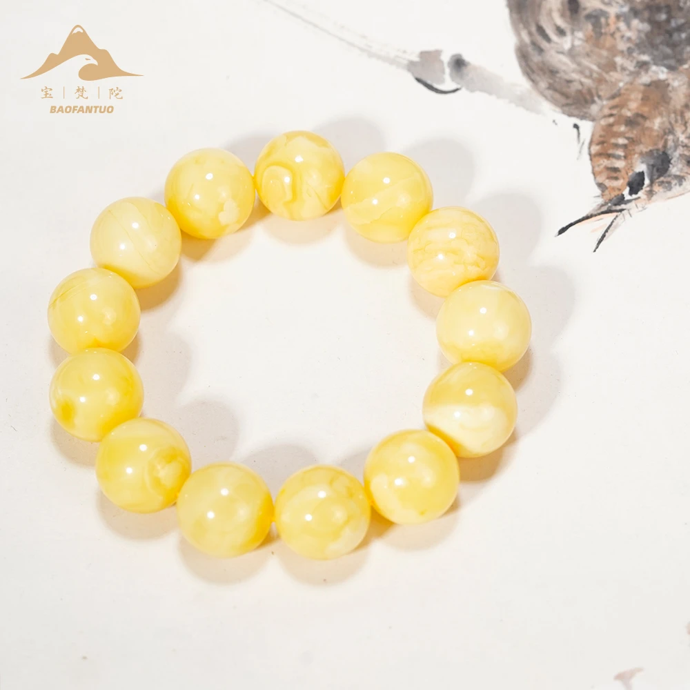 宝梵陀蜜蜡⻩⽩花手串【扣肉推荐】3745