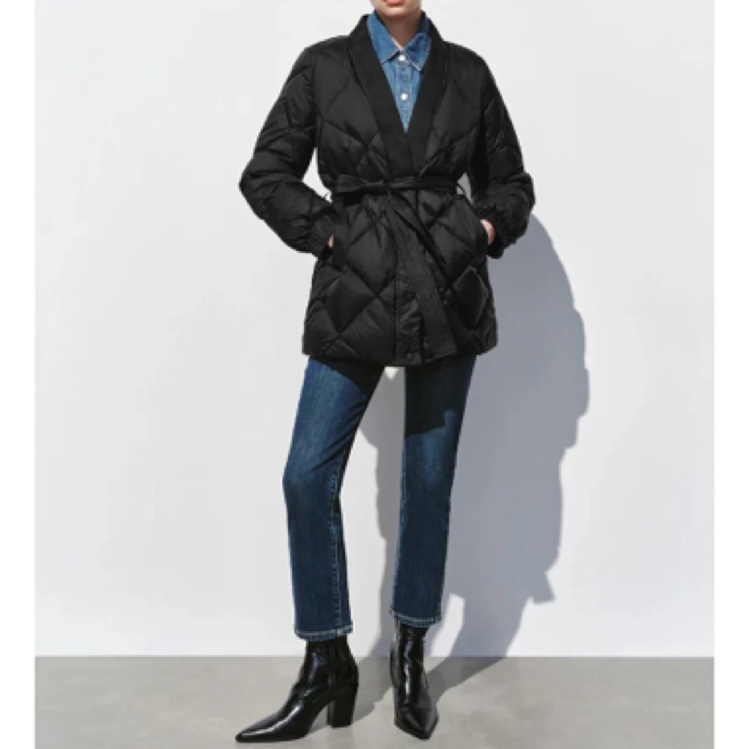 U家2024新款冬季女装时尚长袖气质外套 99-189