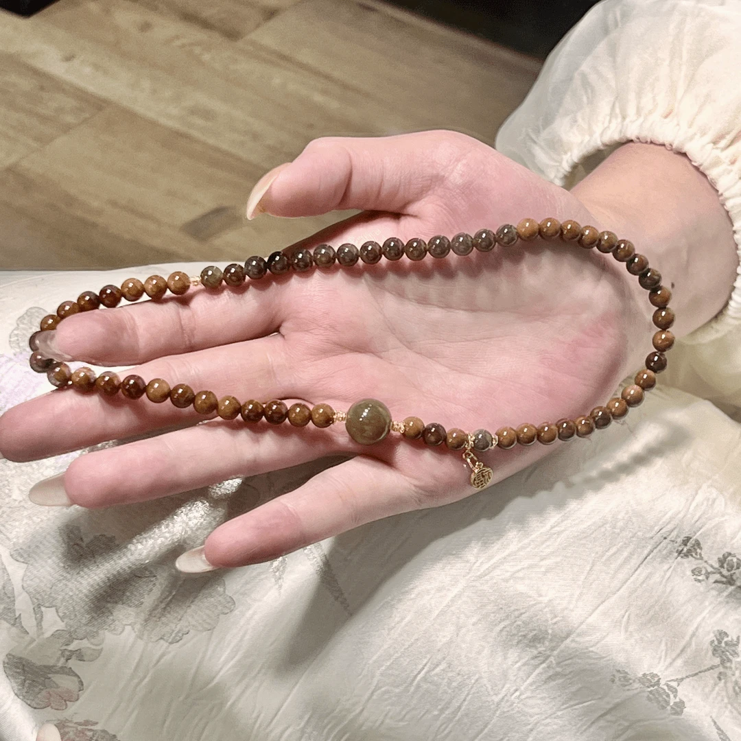 06库克菩提搭配且末糖双圈手链