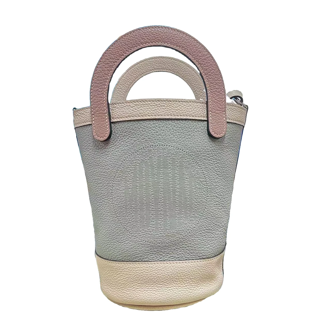 95新 MOYNAT/摩奈 安洁利阿健摩奈双拼色水桶单肩包zb01380