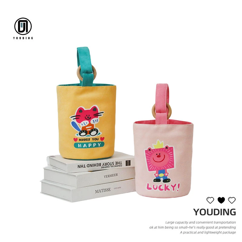 柚町x机器猫卡通插画布艺水桶包百搭原创手提单肩通用布包便携
