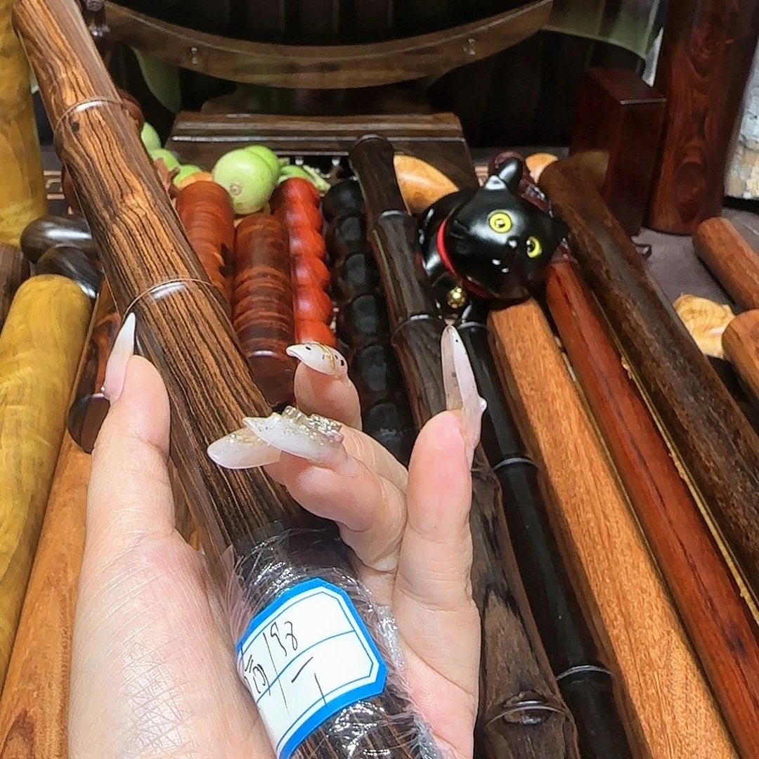 木偷**。紫光檀的竹节一物一拍