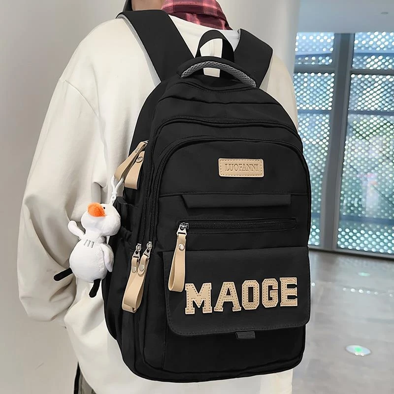 大容量多层书包高中生大容量双肩包减负超轻便大学生电脑背包男