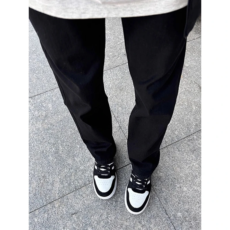 黑色弯刀牛仔裤男款春秋季美式高街vibe风裤子潮牌修身显瘦直筒裤