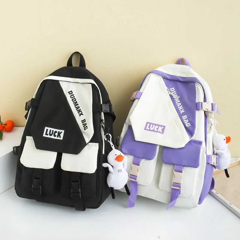 时尚简约百搭书包初中生小学生大容量高颜值潮流韩版休闲双肩包