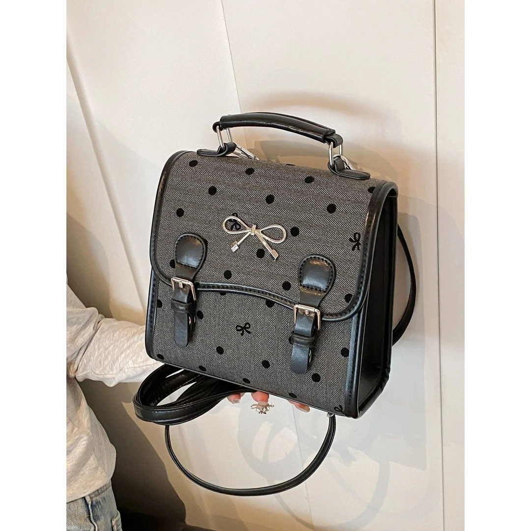 今年流行超火小众波点女式双肩包2024新款百搭后背包时尚迷你书包