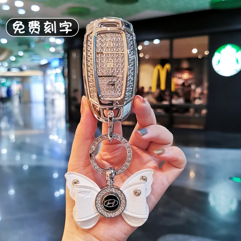 适用现代钥匙套伊兰特ix35名图ix25菲斯塔索纳塔瑞纳库斯途女包扣