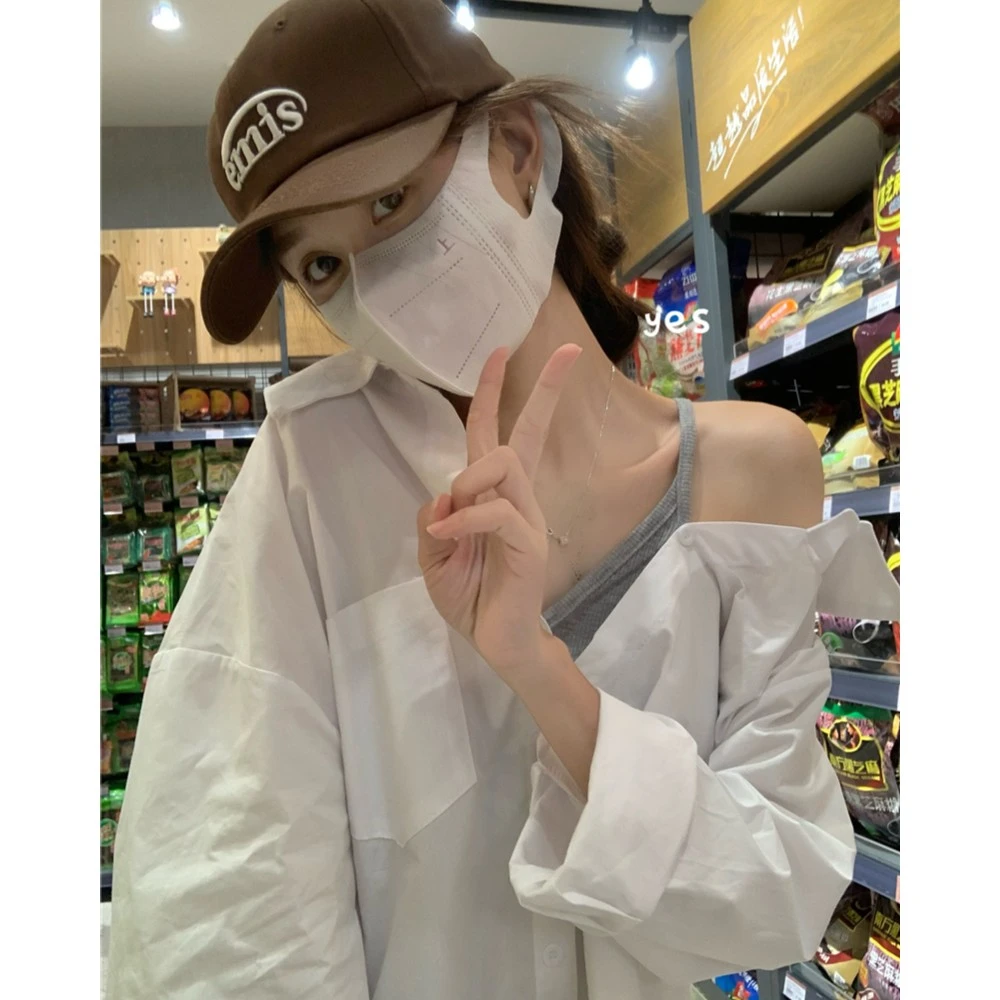 小众设计感拼接一字肩吊带白色衬衫女装秋季新款假两件长袖上衣潮