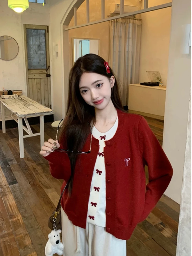 蝴蝶结刺绣甜美红色长袖针织衫女2025秋冬新款假两件宽松小众毛衣