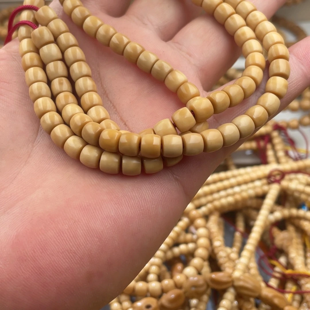 龙眼菩提把件顺黄老料7*6直切长串有钥匙孔无泡药