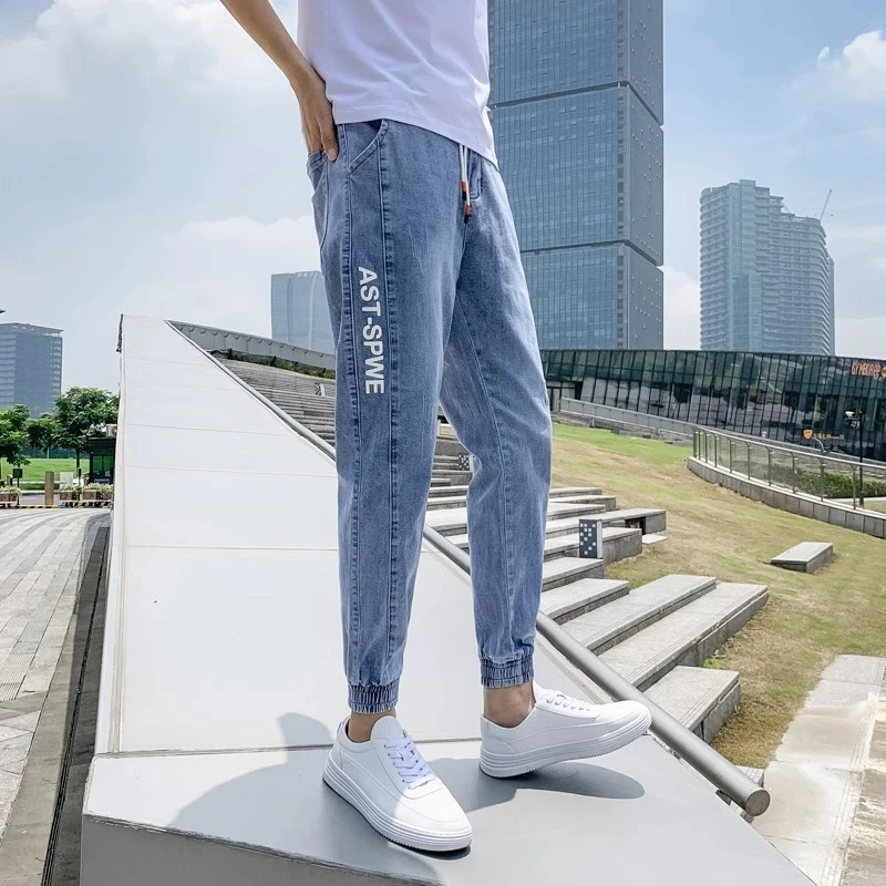 牛仔裤男修身小脚学生秋季潮牌系绳九分裤印花韩版百搭束脚休闲裤